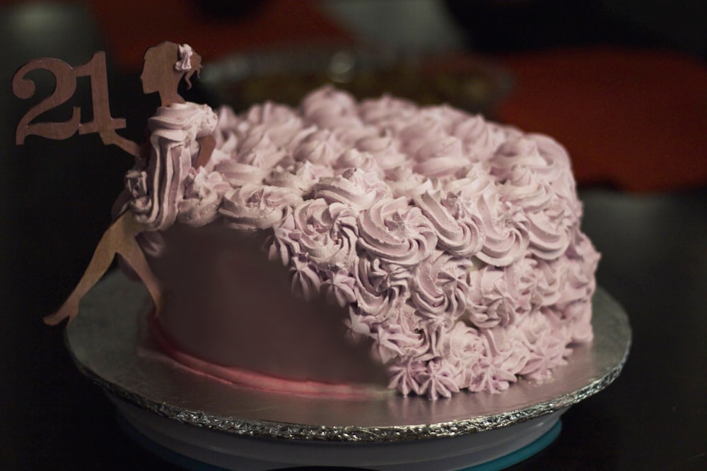 a cake that has a figure on top of it