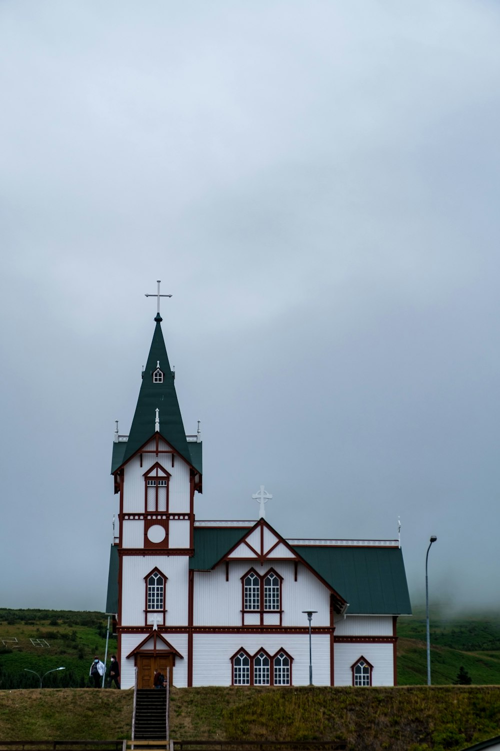 a church with a steeple and a steeple on top