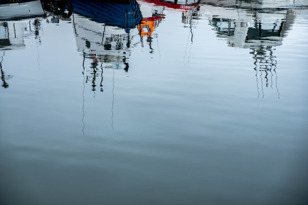 a group of boats that are sitting in the water