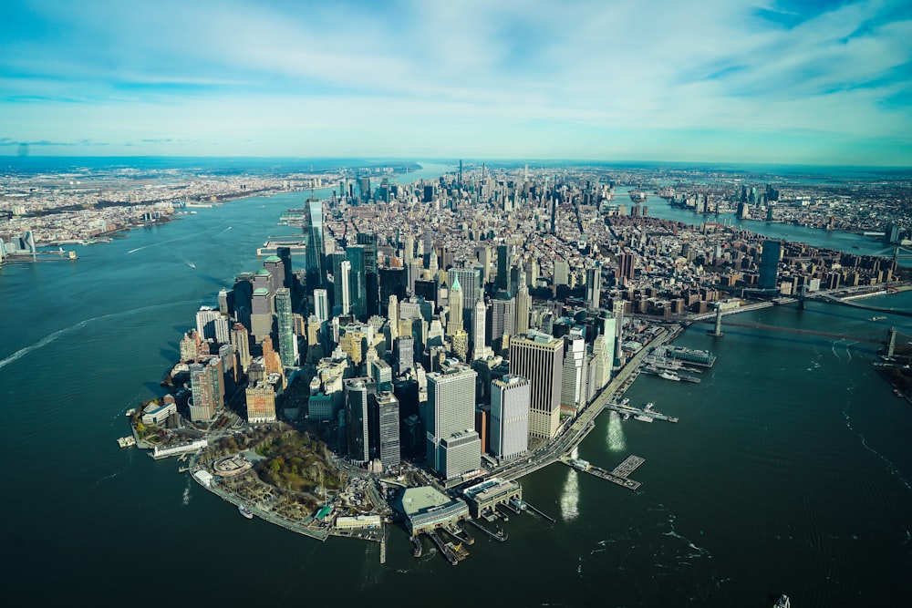 an aerial view of a large city in the middle of the ocean