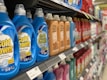 bottles of cold power on a shelf in a store