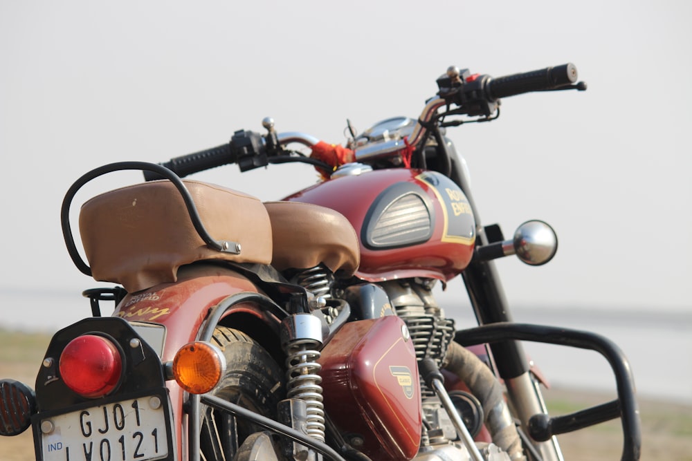 a close up of a motorcycle parked on the side of the road