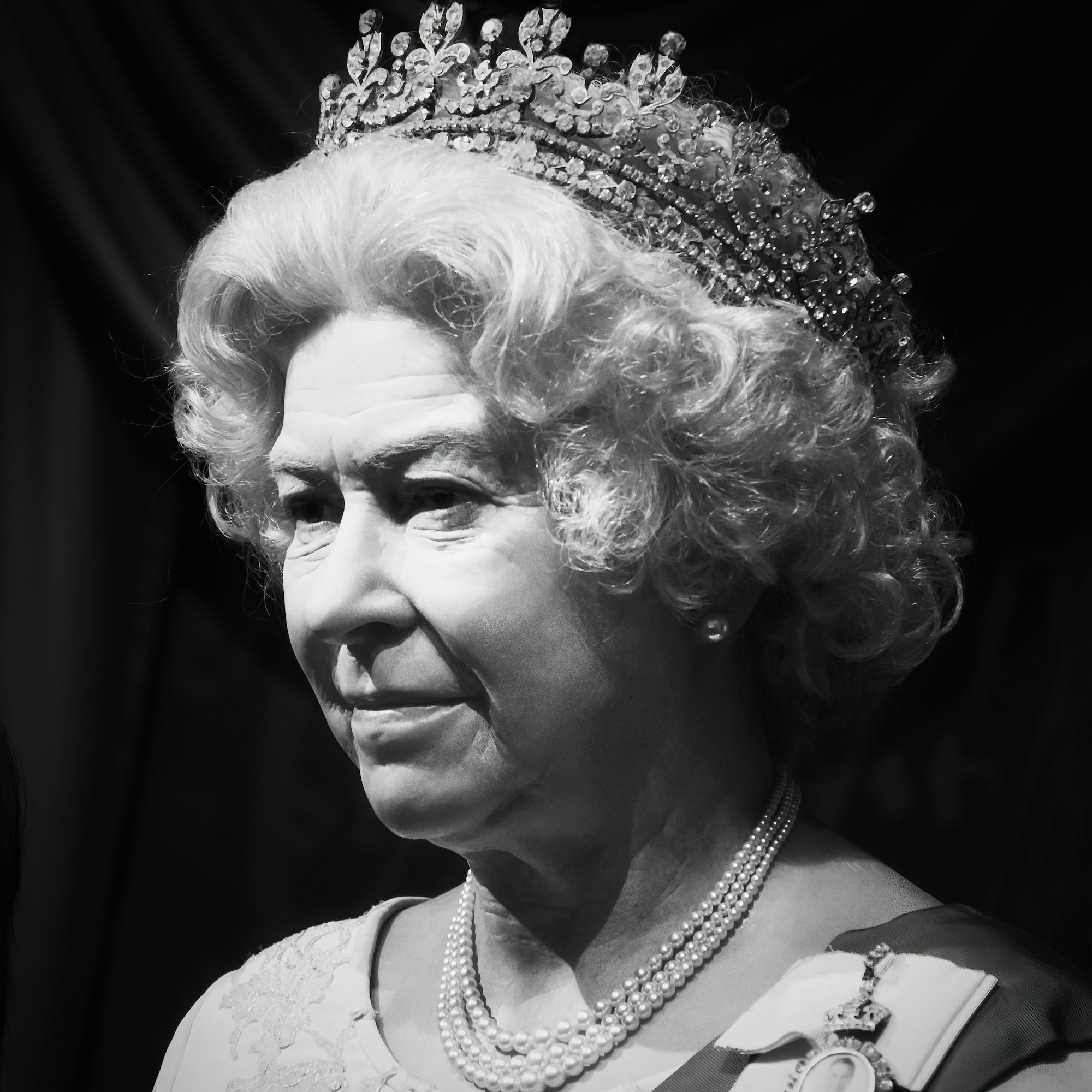 Waxwork of Queen Elizabeth II on display at Madame Tussauds, Marylebone, London, England.