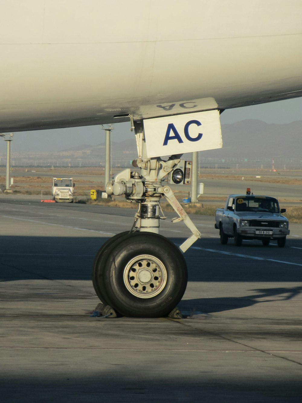 a large jetliner sitting on top of an airport tarmac