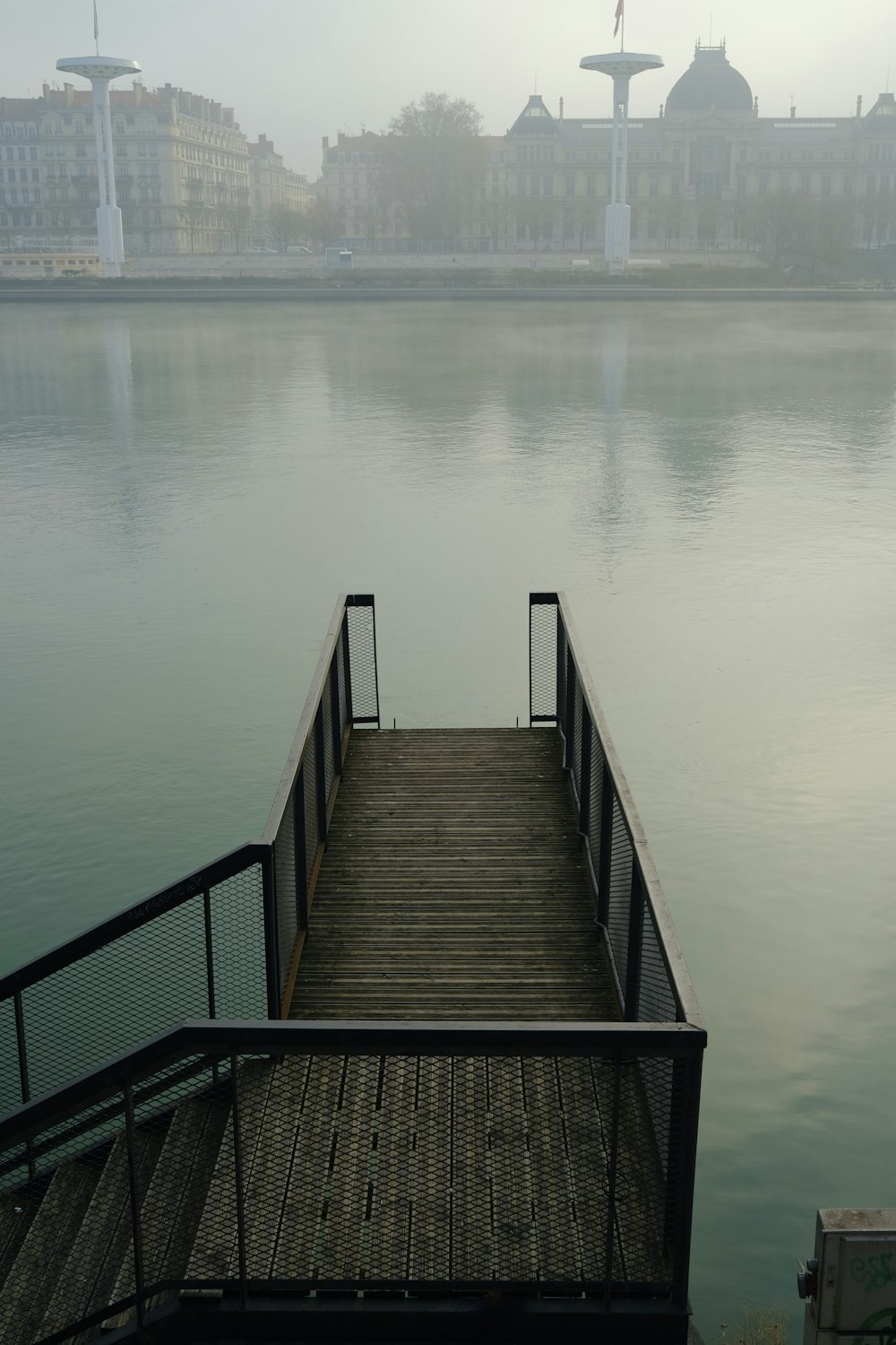 a dock sitting on top of a body of water