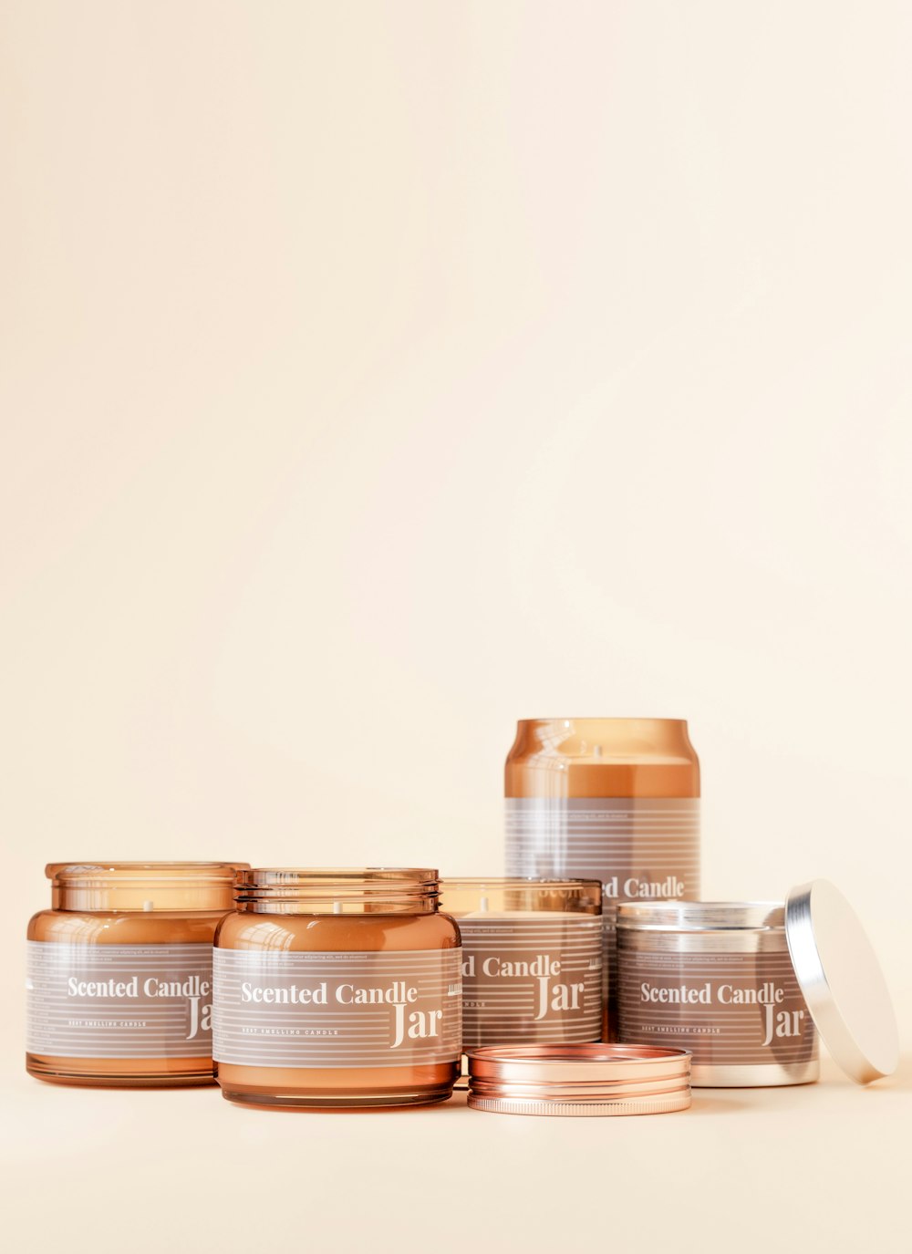 a group of jars of candles sitting on top of a table