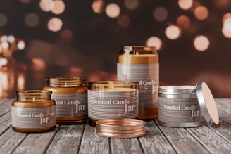 A collection of scented candle jars of various sizes and designs is arranged on a rustic wooden surface. The jars are labeled with the words 'Scented Candle Jar.' The background features a bokeh effect with warm, golden lights, creating a cozy atmosphere.