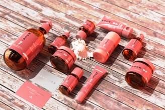 a group of bottles sitting on top of a wooden table