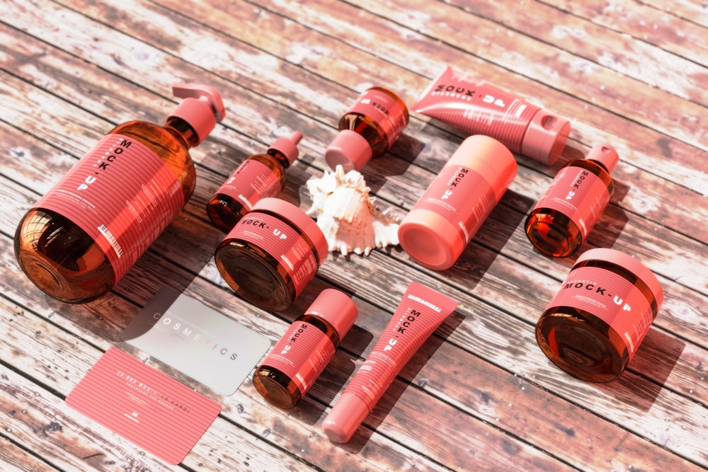 a group of bottles sitting on top of a wooden table