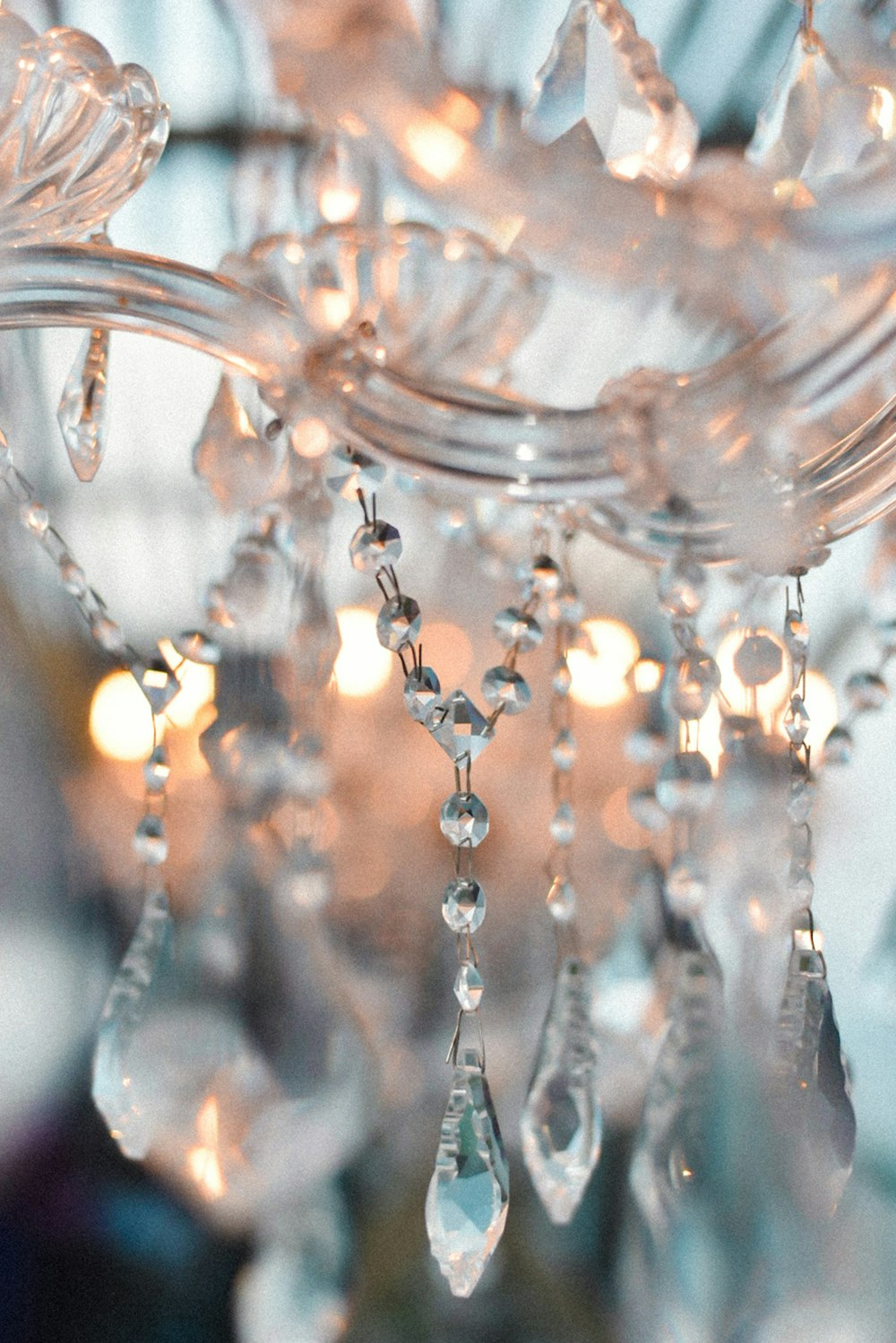 a crystal chandelier hanging from a ceiling