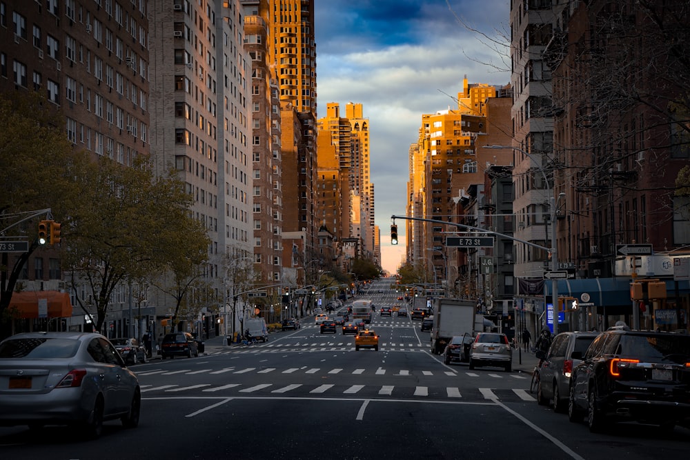 a city street filled with lots of tall buildings