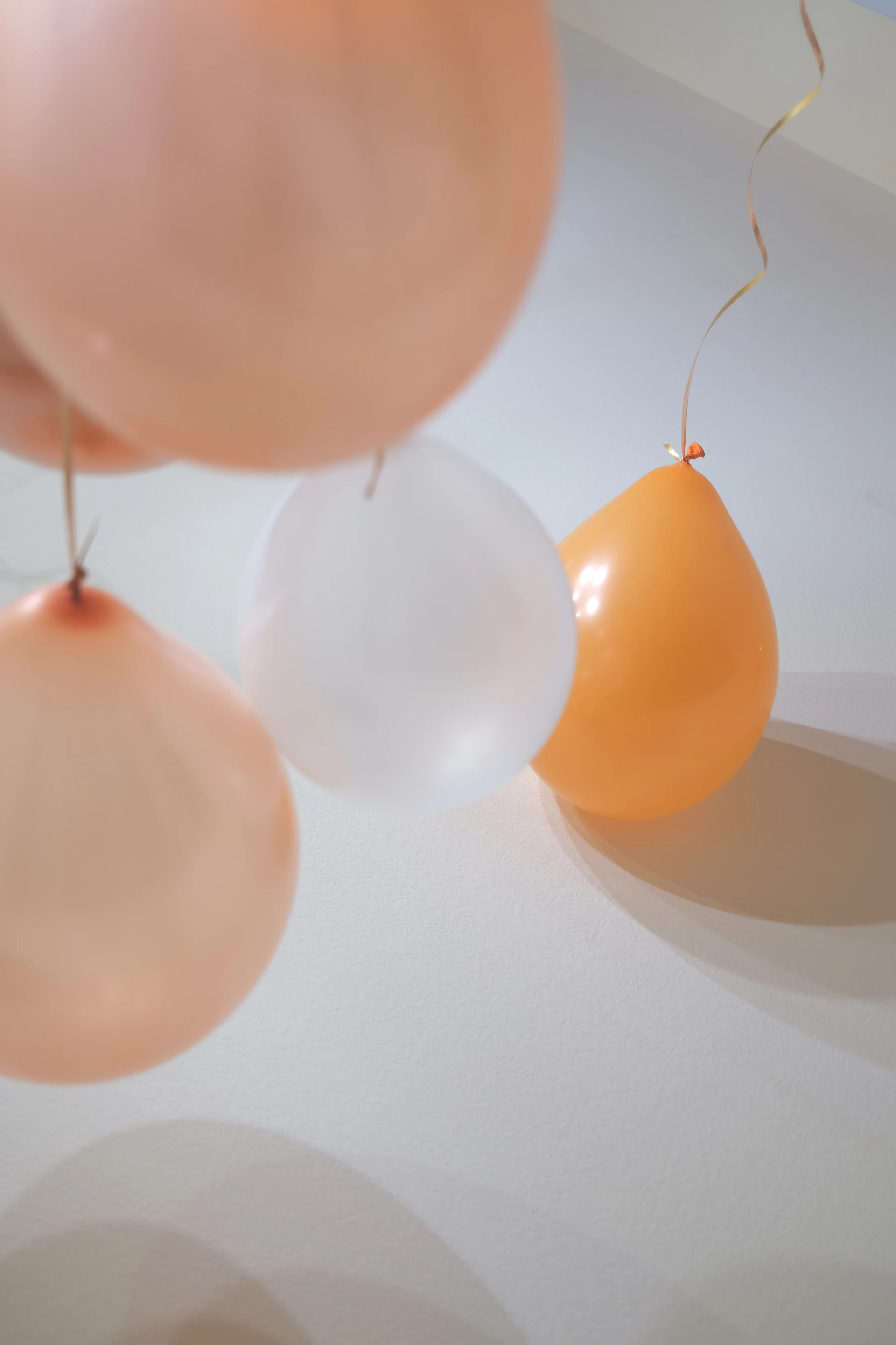 a bunch of balloons floating in the air