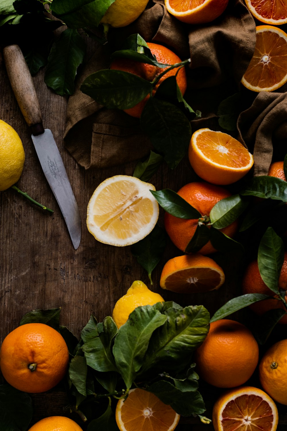 a bunch of oranges that are on a table