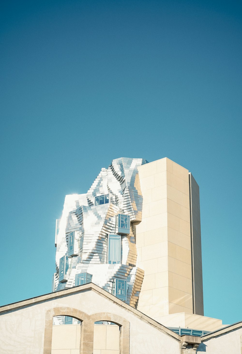 a building with a spiral staircase on top of it