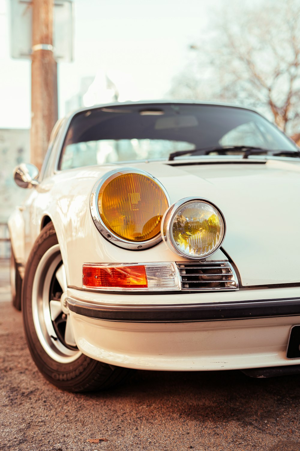 a white car parked in a parking lot