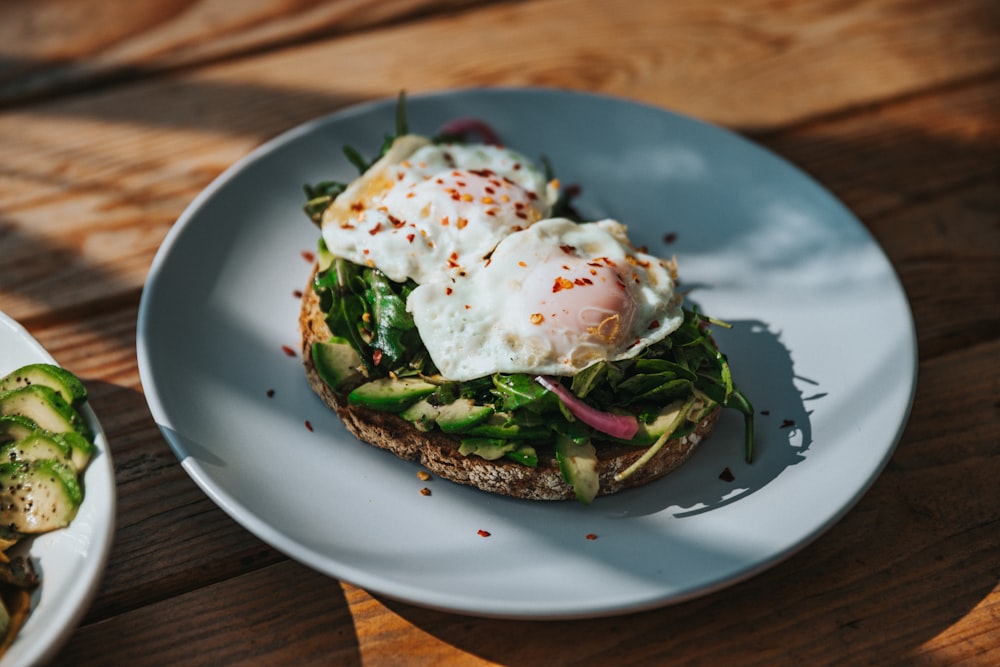 a plate of food on a wooden table