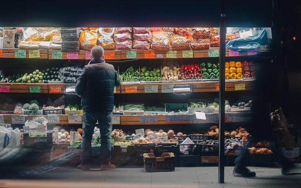 a person standing in front of a store