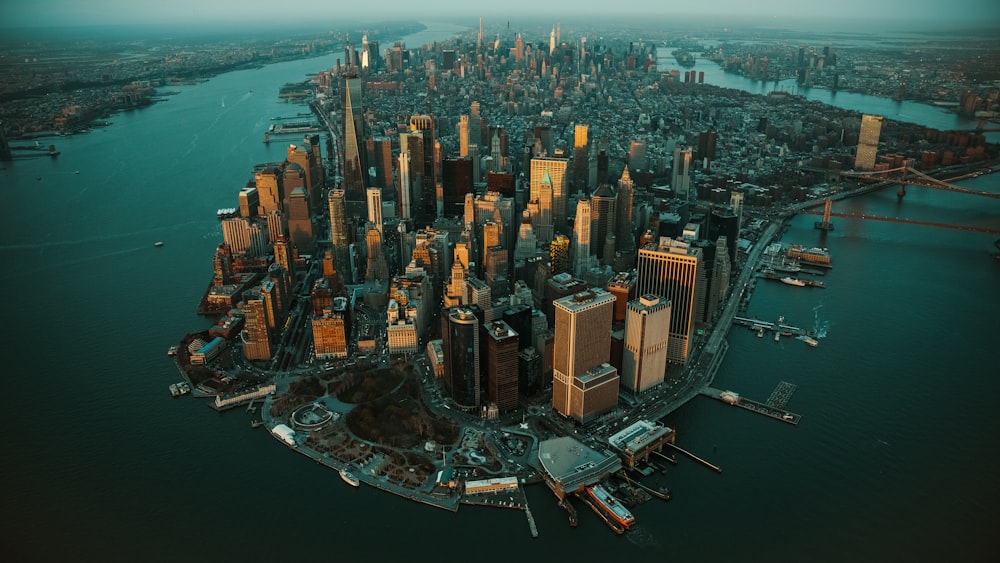 an aerial view of a large city in the middle of the ocean