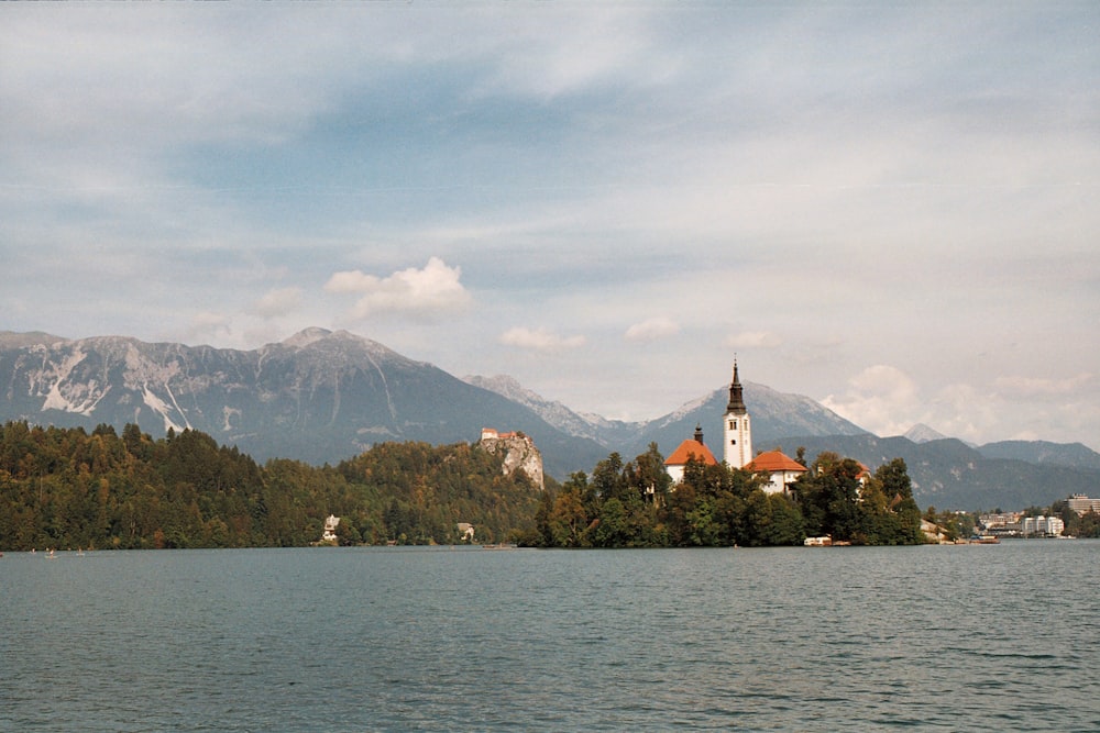 a church on a small island in the middle of a lake