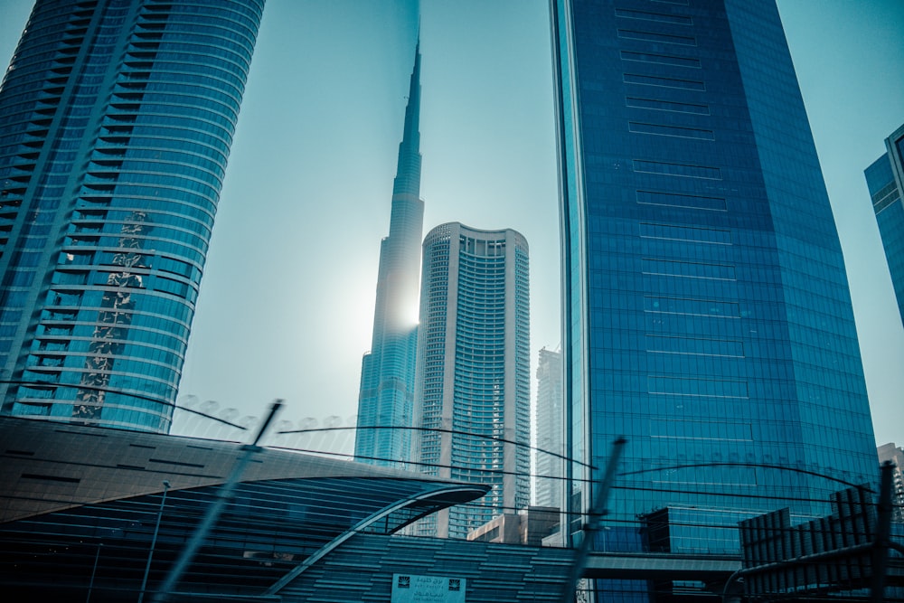 a view of some very tall buildings in a city