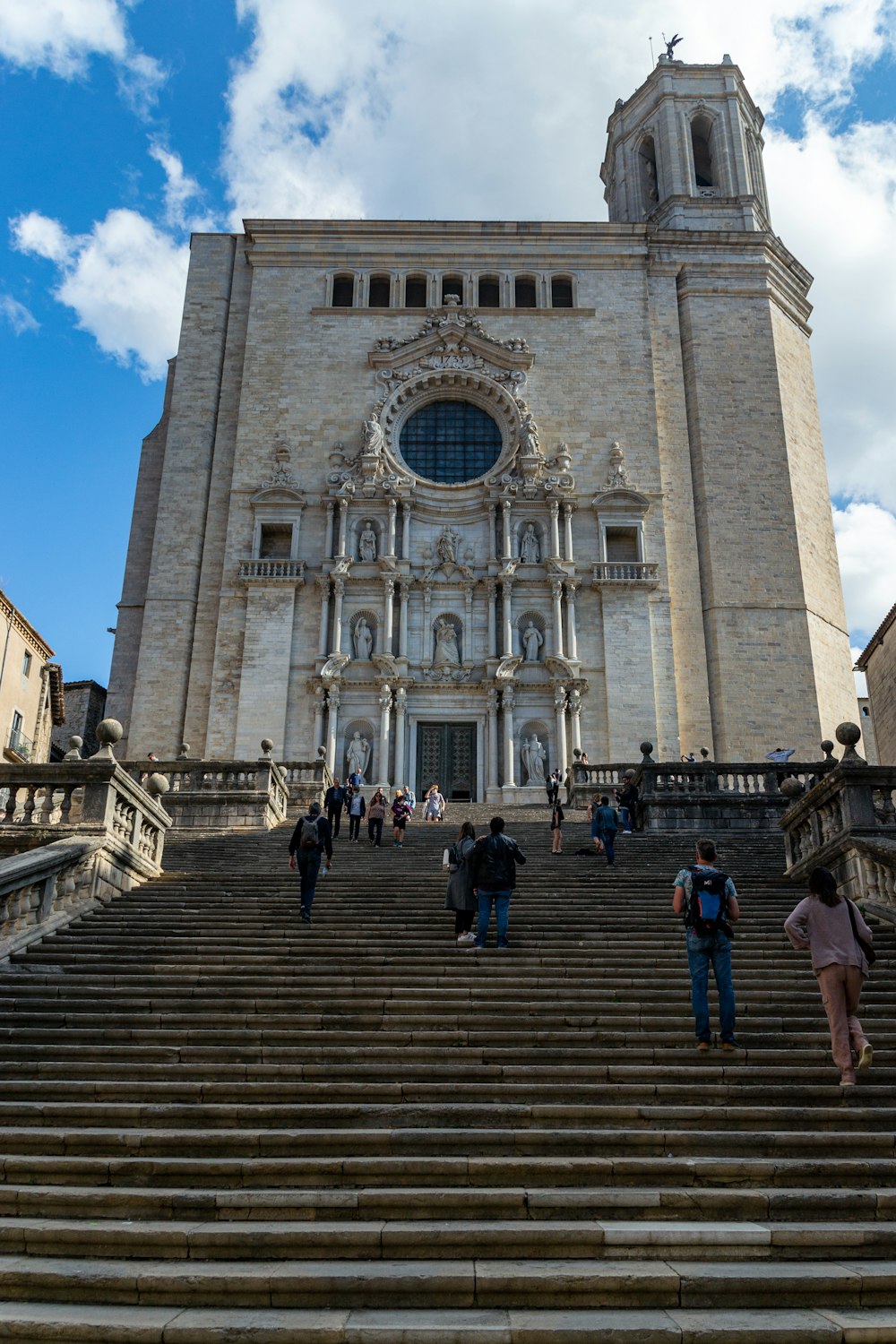 a group of people walking up and down a set of stairs