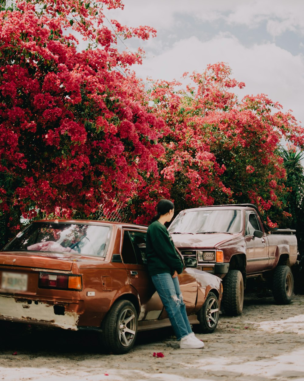 a man sitting in the back of a truck