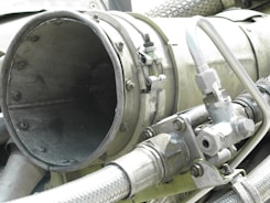 Close-up of a technician inspecting industrial cleaning equipment