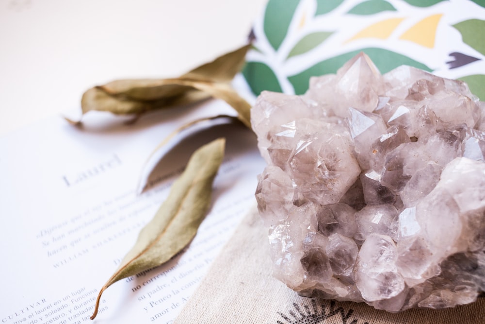 a bunch of crystals sitting on top of a piece of paper