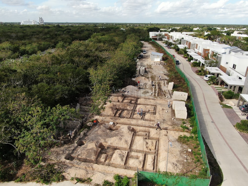 an aerial view of a construction site in a tropical area