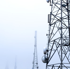 a tower with several cell phones on top of it