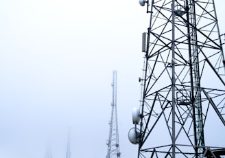 a tower with several cell phones on top of it