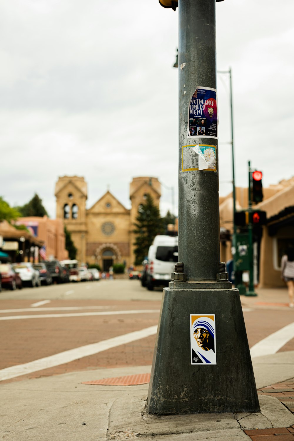 a pole with a bunch of stickers on it