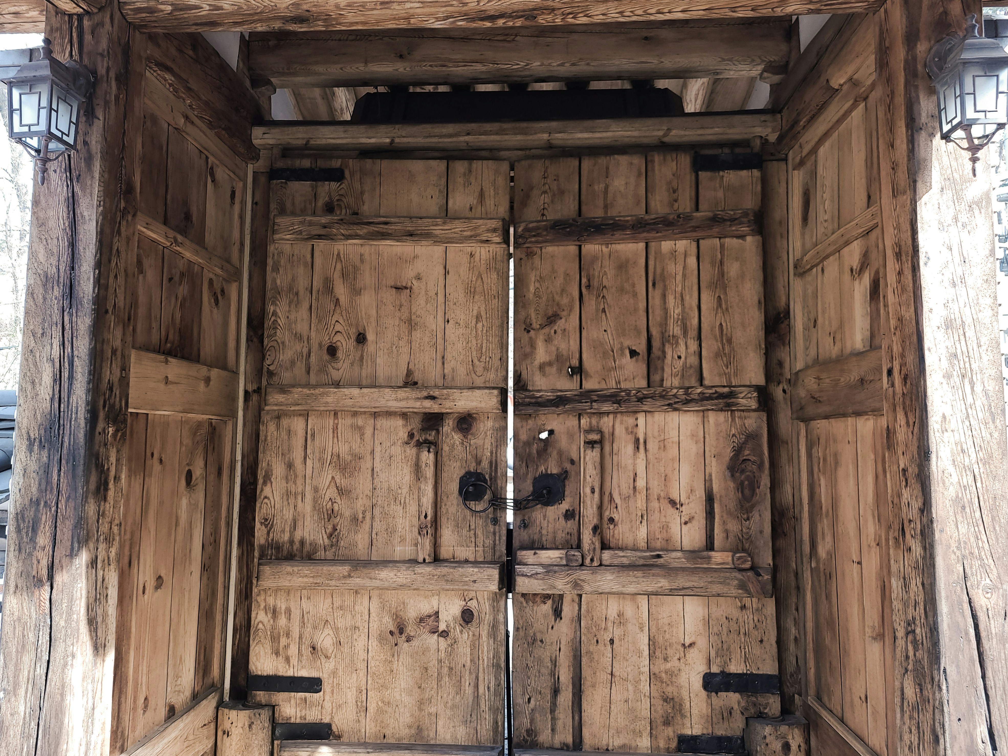 an open wooden door in a building
