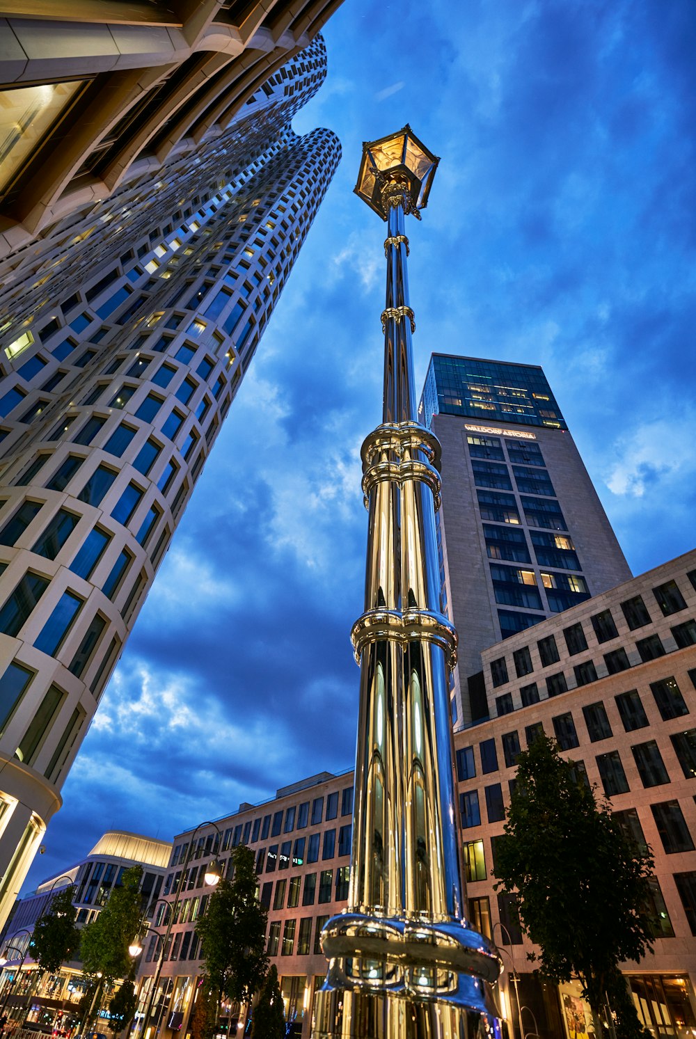 a very tall tower with a clock on it's side