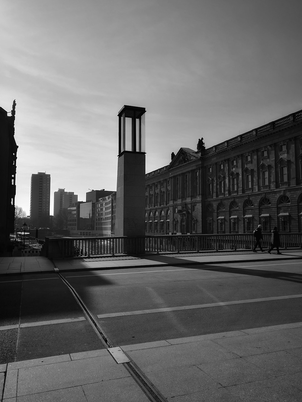 a black and white photo of a clock tower