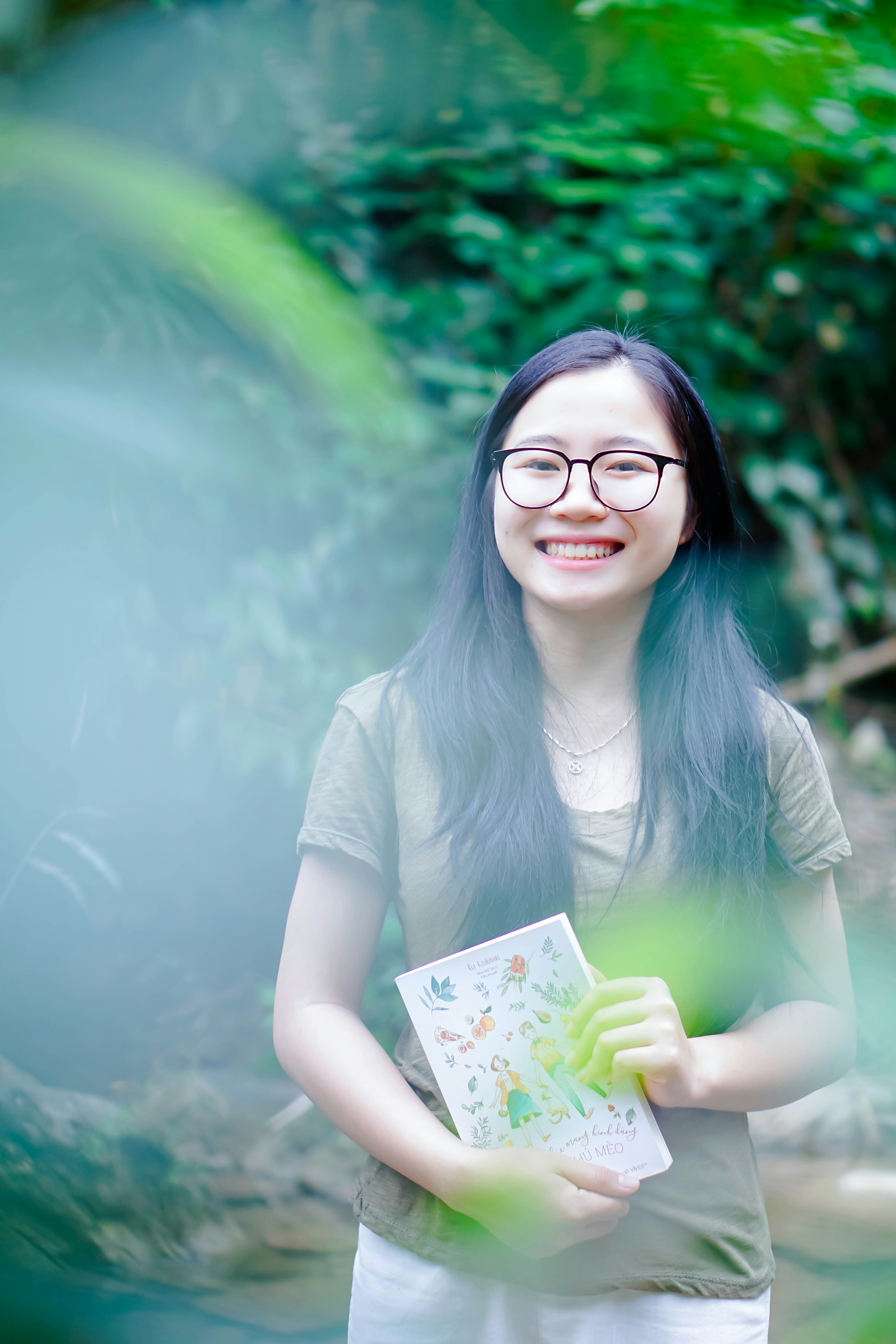 A young woman smile and relaxing in the forest.