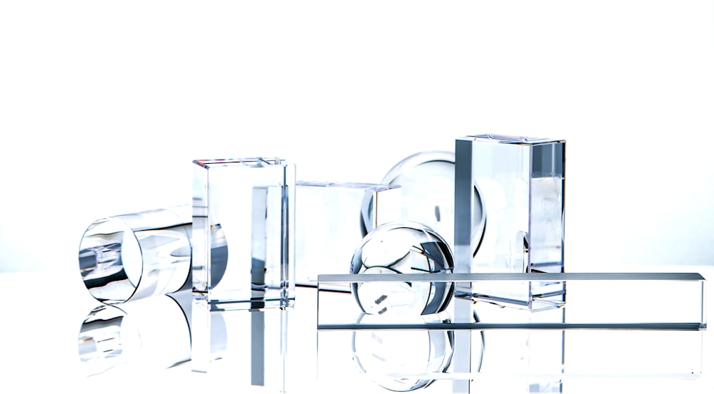 a group of glass objects sitting on top of a table