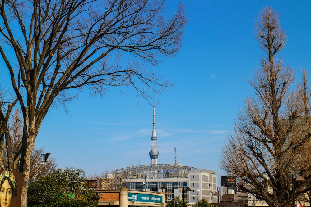 a tall building with a tower in the background