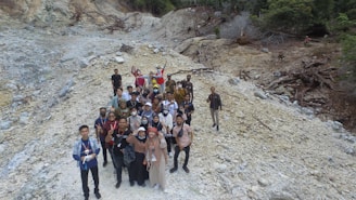 A group of photographers smiling together at a scenic outdoor location in El Salvador.