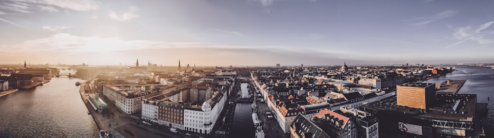 an aerial view of a city with a river running through it