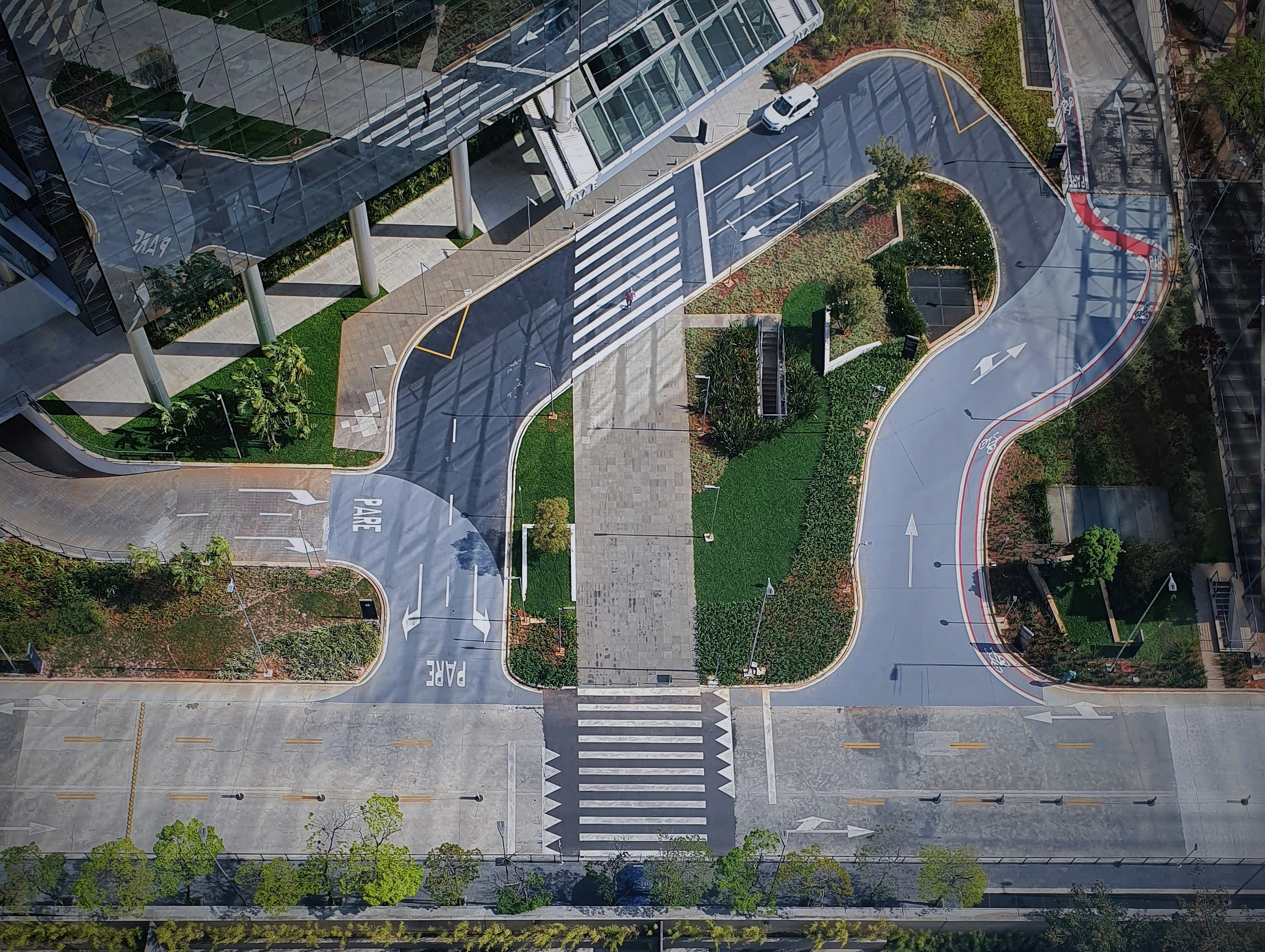 An aerial view of a street intersection with a bus photo – Free ...