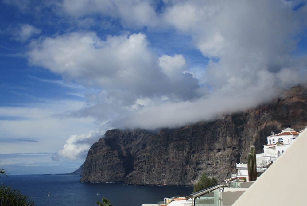 a view of a mountain and a body of water