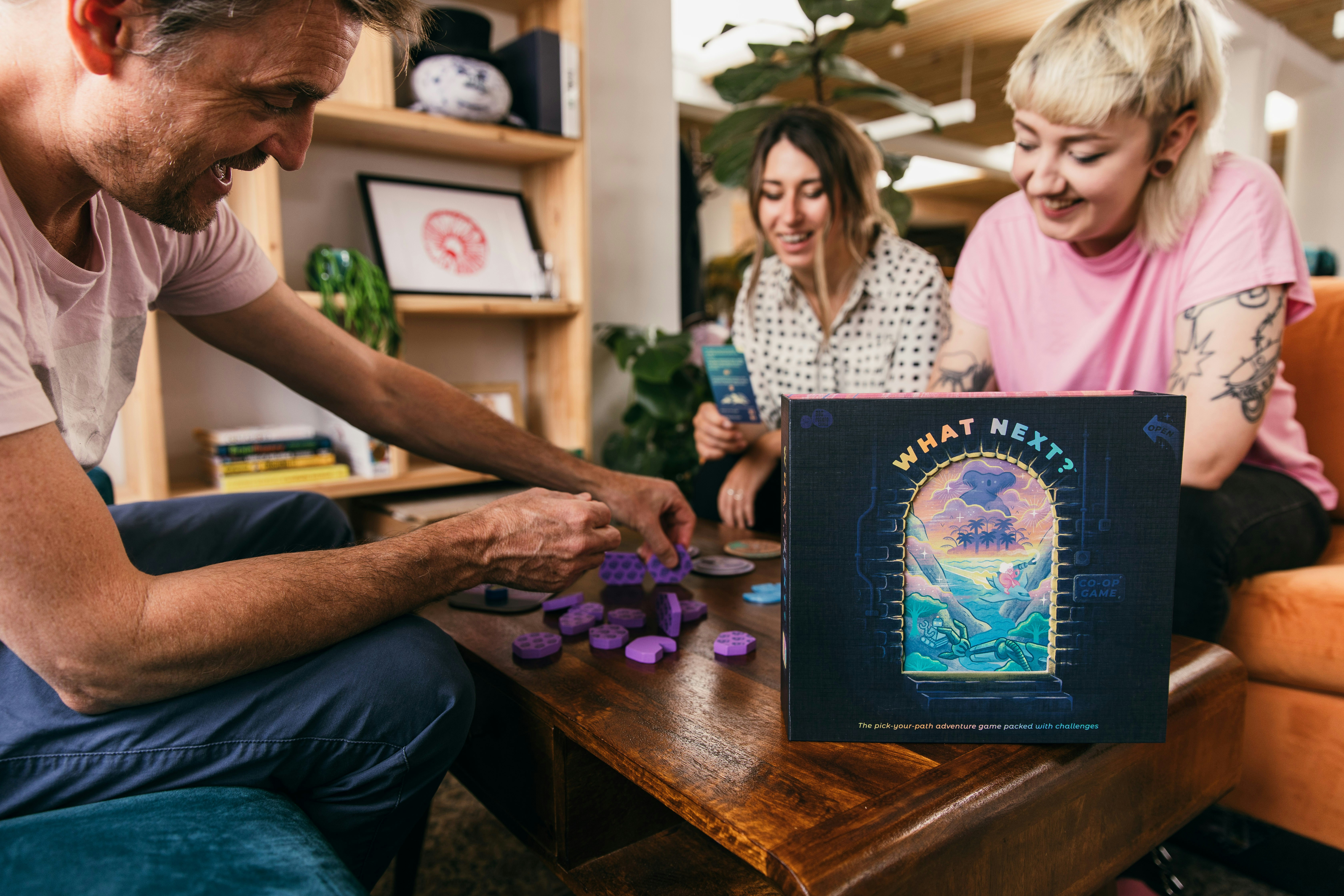 People are setting up a board game.