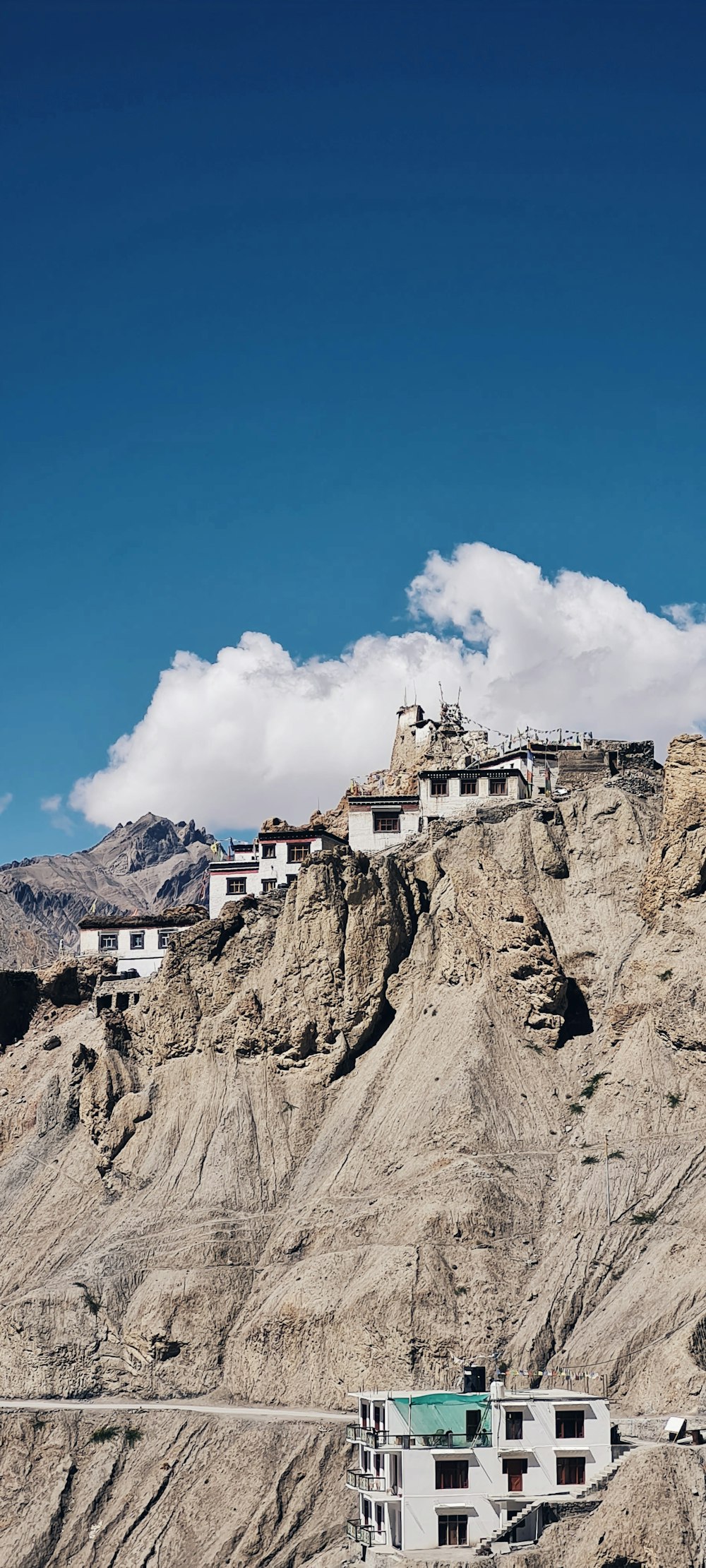 a mountain with a building on top of it