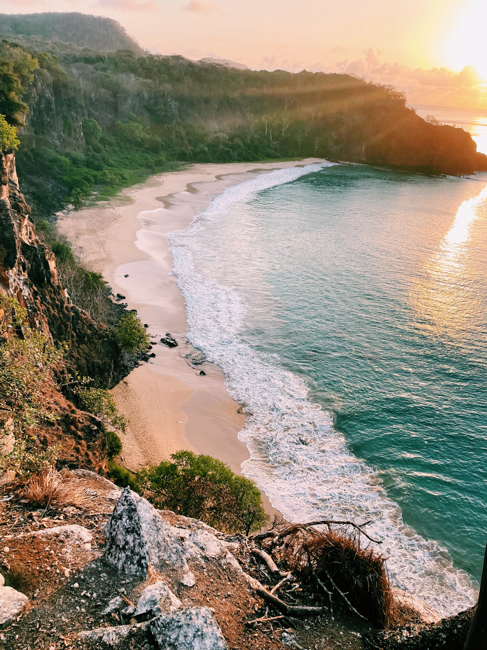 Aerial view of a turquoise-water cove at Fernando de Noronha, Brazil