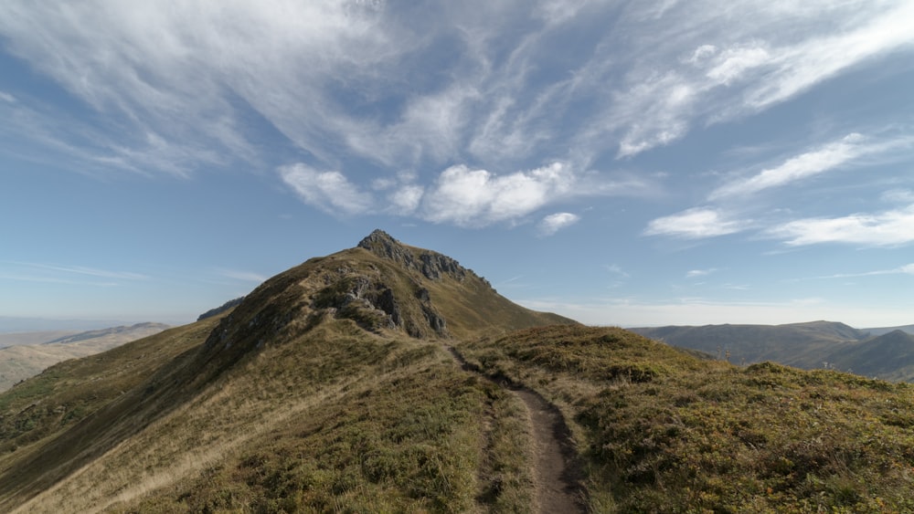 a mountain with a trail going up the side of it