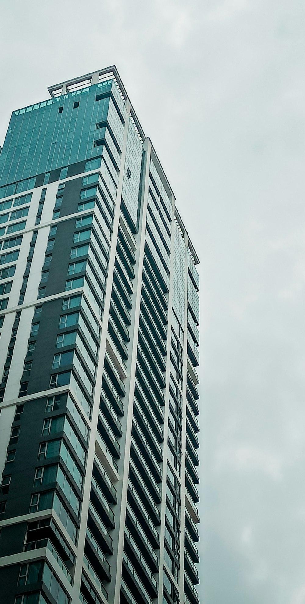 a tall building with a clock on the side of it