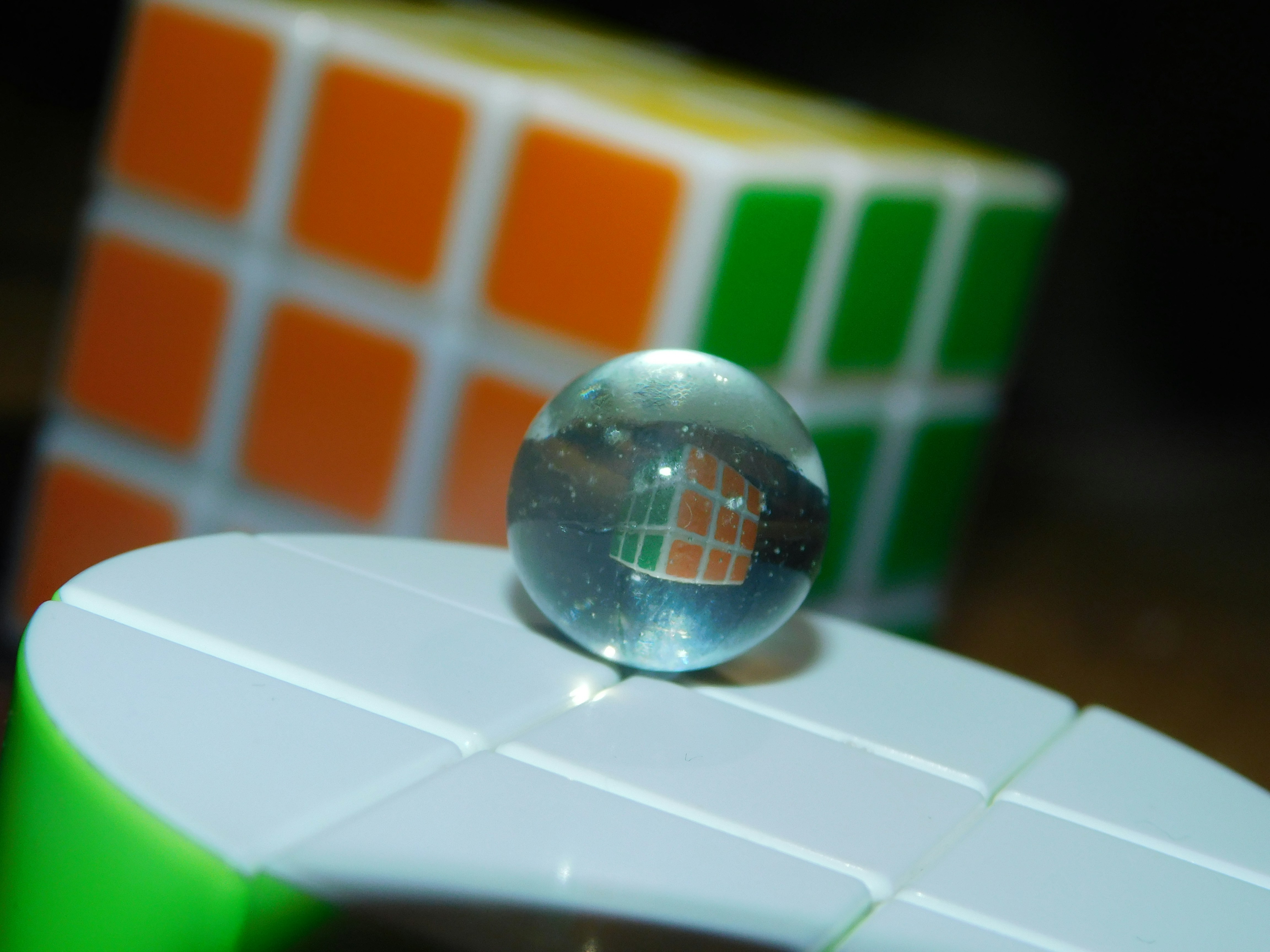 Rubik cubes and glass sphere