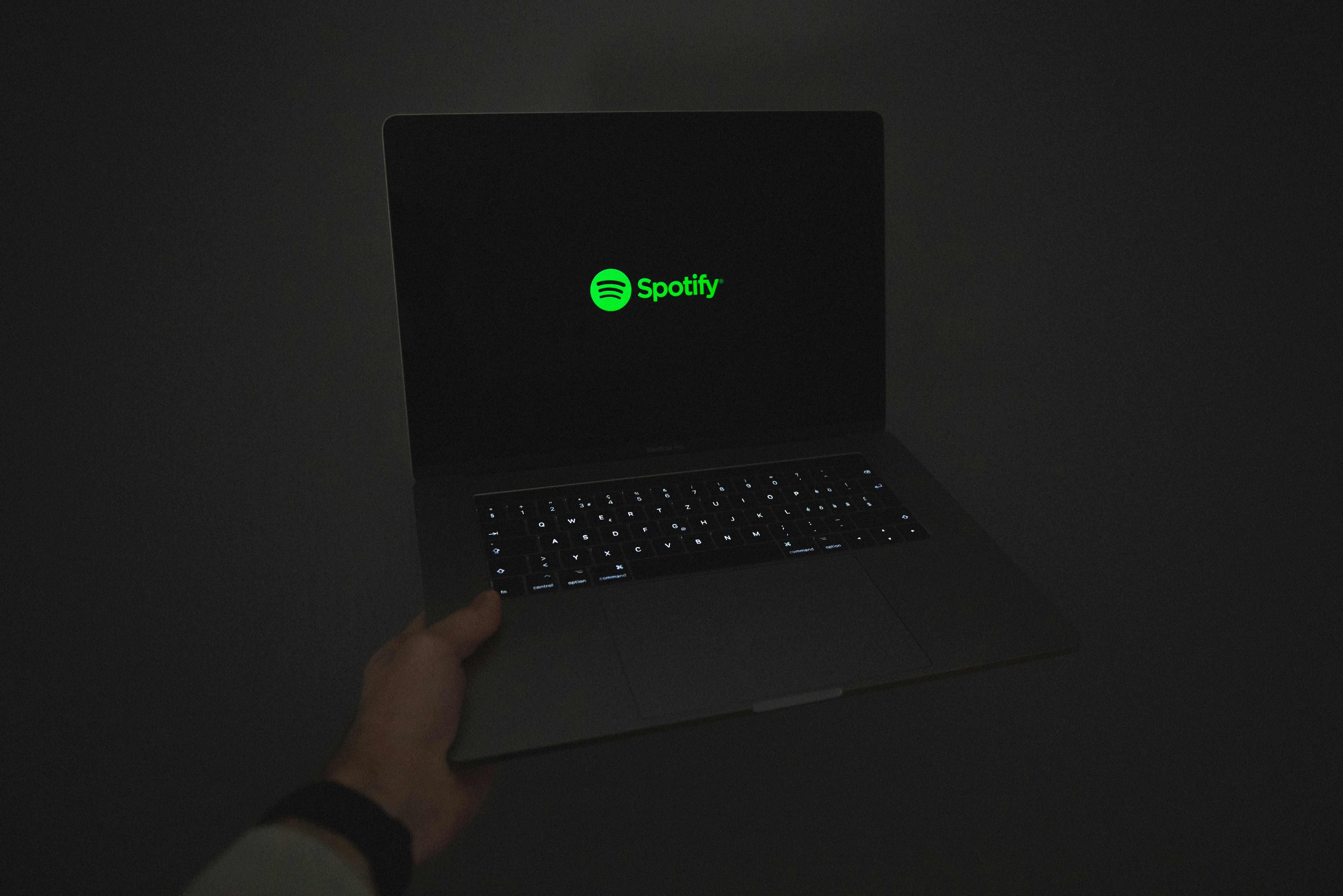 Listening to Spotify on a MacBook Pro
