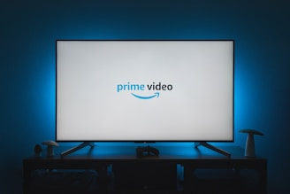 a television screen with the prime video logo on it